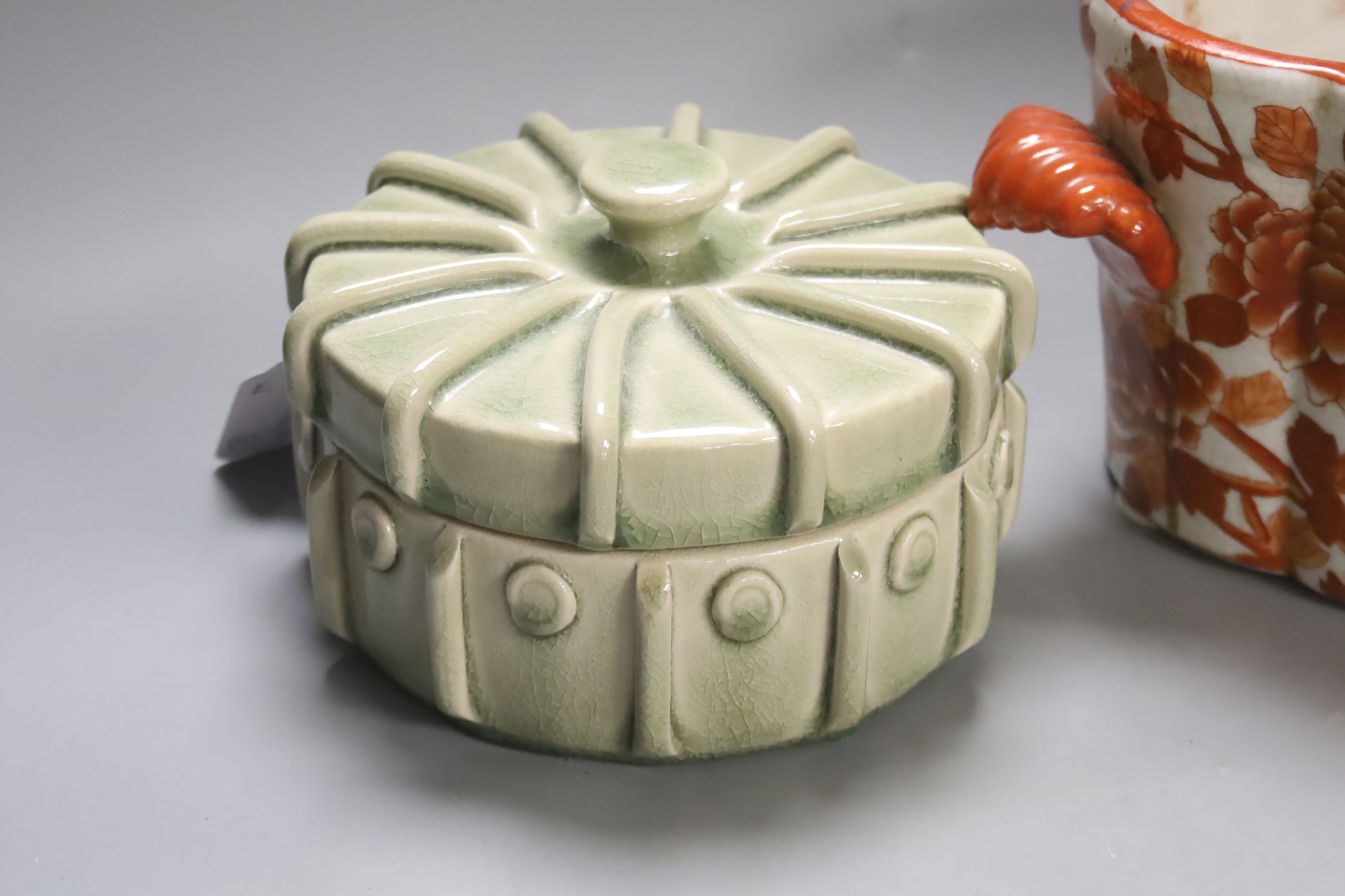 A Chinese cong-form celadon glazed table lamp, Guangxu mark and probably of the period (1875-1908), height 34cm excluding light fitting (drilled) a celadon glazed box and cover and an oval two-handled jardinière